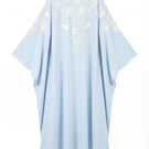 Light blue floral embellished maxi dress by Shatha Essa with intricate floral details and flowing fabric.