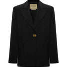 Black Earth Blazer jacket by Acaria Studio, shown on a hanger with detailed fabric and tailored fit.