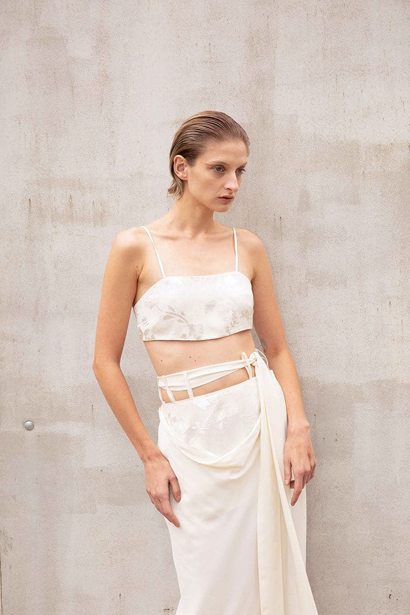 Vaska beige crop top for women, featuring a stylish and trendy design, ideal for casual or summer wear.
