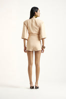 Deme By Gabriella gold co-ord set featuring a stylish matching top and pants, perfect for fashionable casual wear.
