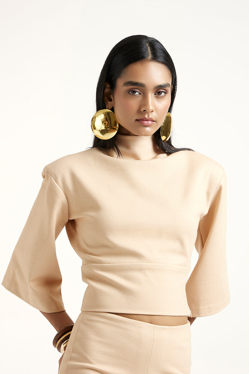 Deme By Gabriella gold co-ord set featuring matching top and trousers, stylish and comfortable for casual or dressy occasions.