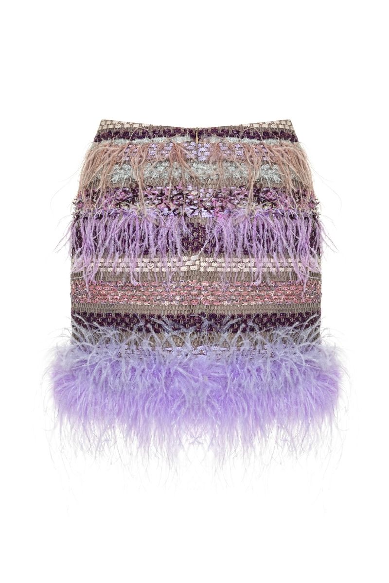 Lalo Avril mini skirt in purple multicolor fabric with a fitted waist and short hemline, styled with casual accessories.