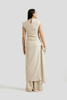 Deme By Gabriella Antonia three-piece beige co-ord outfit set featuring a matching top and pants on a hanger.