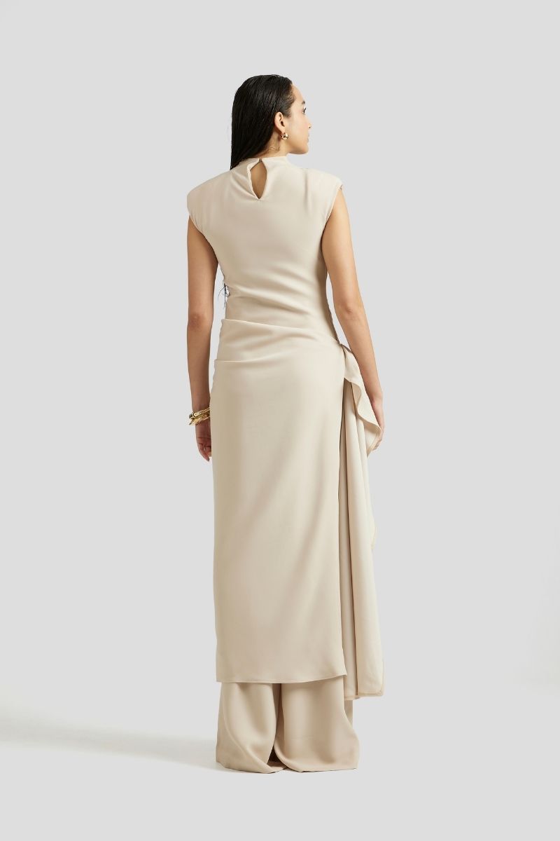Deme By Gabriella Antonia three-piece beige co-ord outfit set featuring a matching top and pants on a hanger.