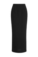 Keira Tong maxi peplum skirt with fitted waist and flared hem, in lightweight fabric, stylish and elegant for casual or dressy wear.