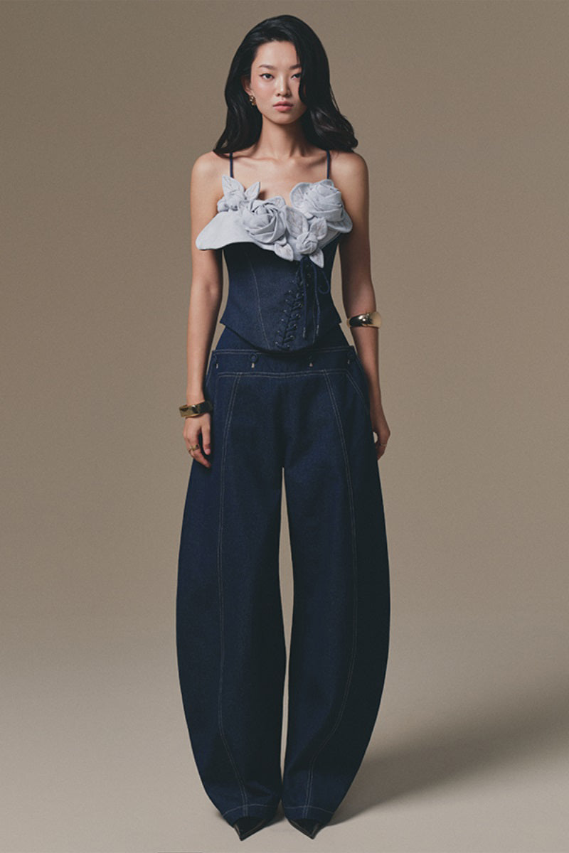 Keira Tong Petal Bustier Top in soft fabric with floral petal design, sleeveless style, and fitted silhouette.