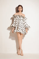 Valenciani white voluminous short ruffle dress, mini length, with layered ruffle details and a fitted waist, perfect for summer wear.