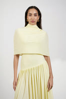 Deme By Gabriella Penelope yellow maxi dress featuring flowing fabric and sleeveless design, perfect for summer occasions.