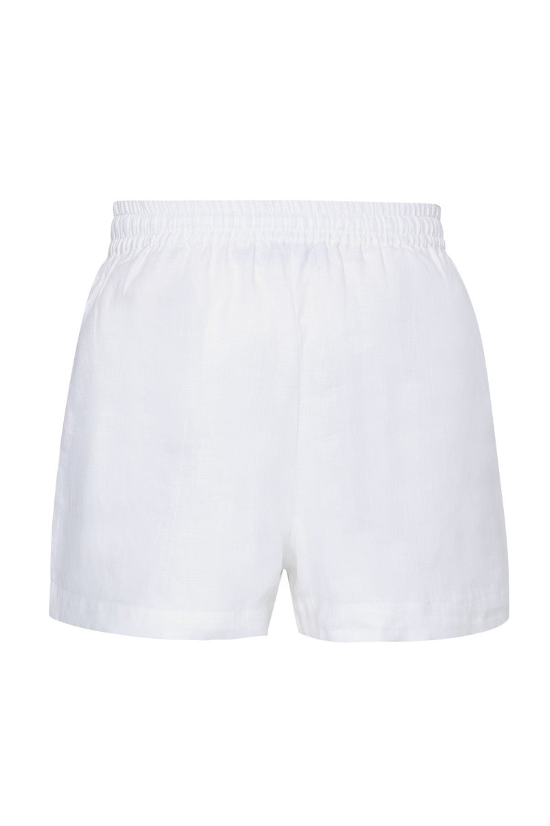 White DEIA shorts by Summer Away, casual denim-style shorts with a relaxed fit, displayed on a neutral background.