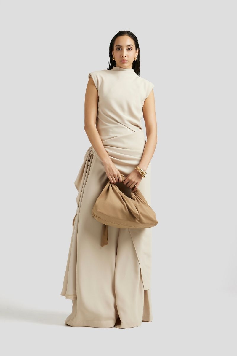 Deme By Gabriella Antonia beige three-piece co-ord set featuring a top, pants, and a matching jacket, styled for casual wear.