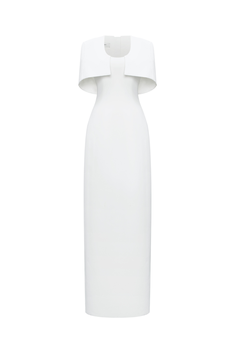Silken Whisper gown by TONYY, elegant satin evening gown with flowing design and delicate details, displayed on a mannequin.