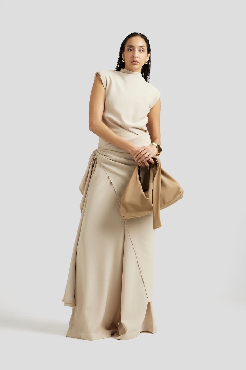 Deme By Gabriella Antonia three-piece beige co-ords outfit set featuring a top, trousers, and matching accessories.