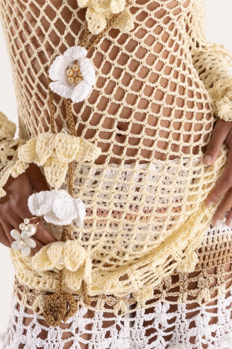 Multicolor handmade crochet top-dress in vanilla tones by Andreeva, featuring intricate crochet patterns and a relaxed fit.