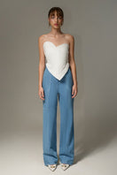 Liya white sweetheart top with adjustable straps and fitted design, perfect for casual or dressy outfits.