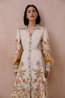 Yellow Raishma Briar maxi dress with flowing fabric and elegant design, perfect for stylish summer or evening wear.