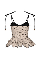 Estefania Rosita peplum top in ivory and black, stylish women's fashion top with a fitted waist and peplum detail.