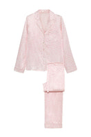 Pink women's pajama set by MANITO featuring soft fabric and comfortable fit, perfect for relaxing nights.