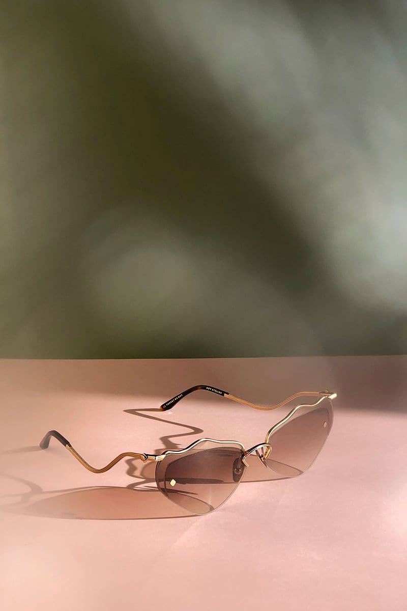 Brown Forget Me Not sunglasses by Moy Atelier featuring round frames and stylish tinted lenses.