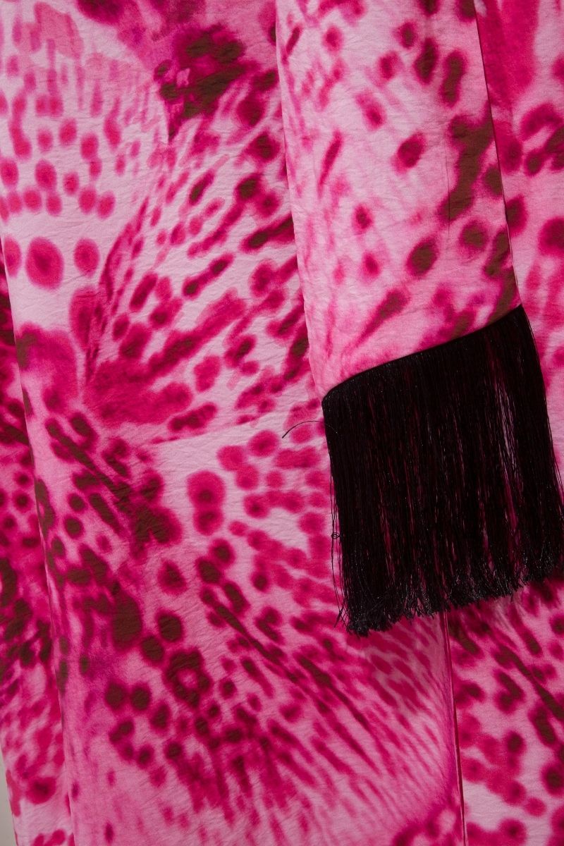 Sisters Amie Maxi Dress in Orchid Glow featuring a flowing silhouette and vibrant purple floral pattern.