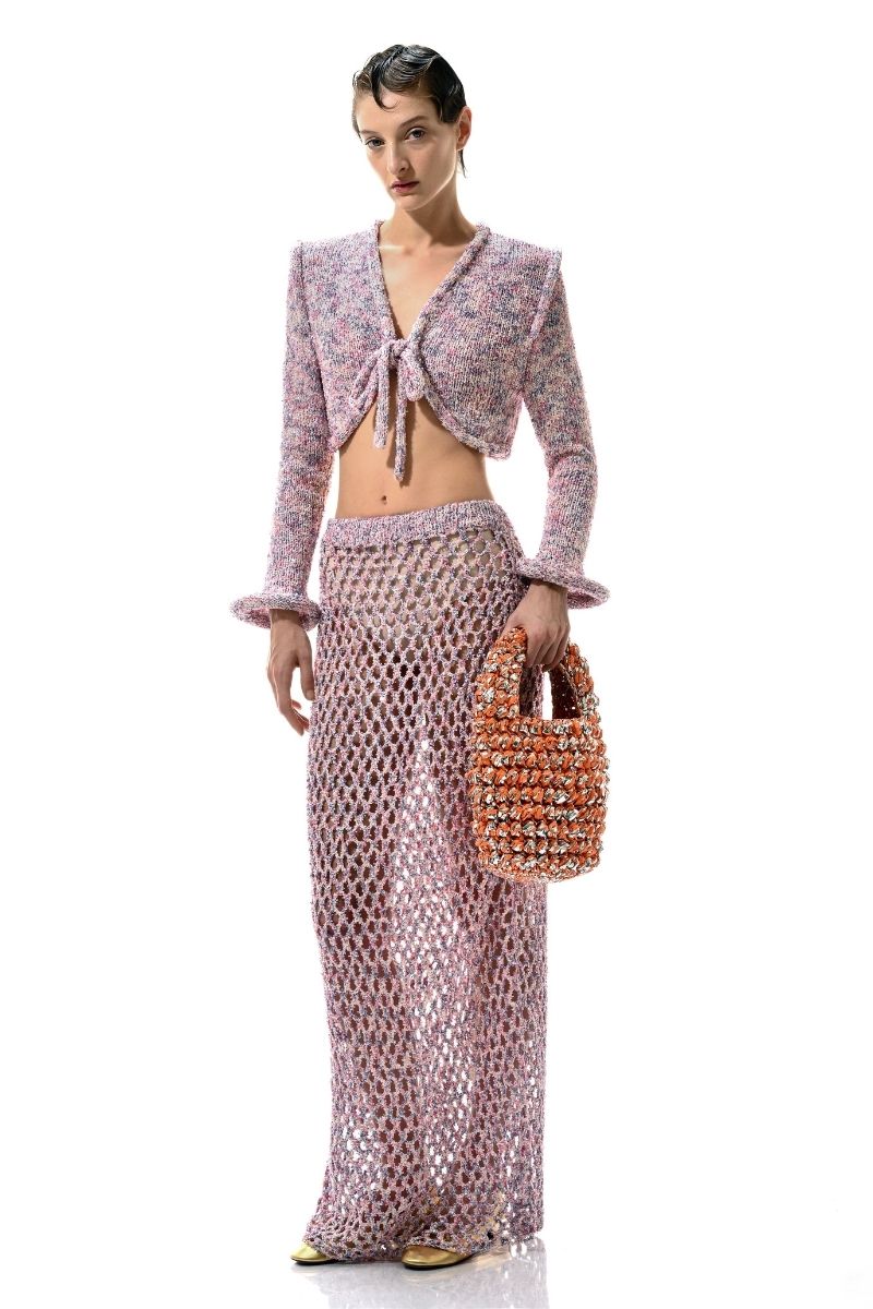 Pink Lalo Sirena Maxi Skirt featuring flowing fabric and a high-waisted design, perfect for elegant casual wear.