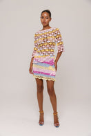 Handmade Bird of Paradise crochet mini skirt by Andreeva featuring intricate crochet details and a vibrant tropical design.