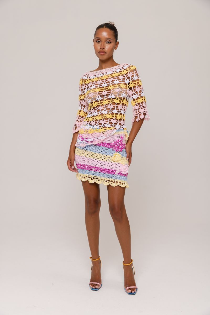 Handmade Bird of Paradise crochet mini skirt by Andreeva featuring intricate crochet details and a vibrant tropical design.