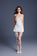 White bouquet corset top by Keira Tong, featuring a fitted design with floral print and structured bust for stylish summer wear.