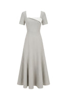 White Plan minimalist square-neck maxi dress featuring a flowy silhouette and sleeveless design, perfect for elegant summer wear.
