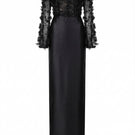 Black Yvette tulle and royal taffeta gown by 21Six, showcasing a flowing, elegant formal dress with intricate fabric details.