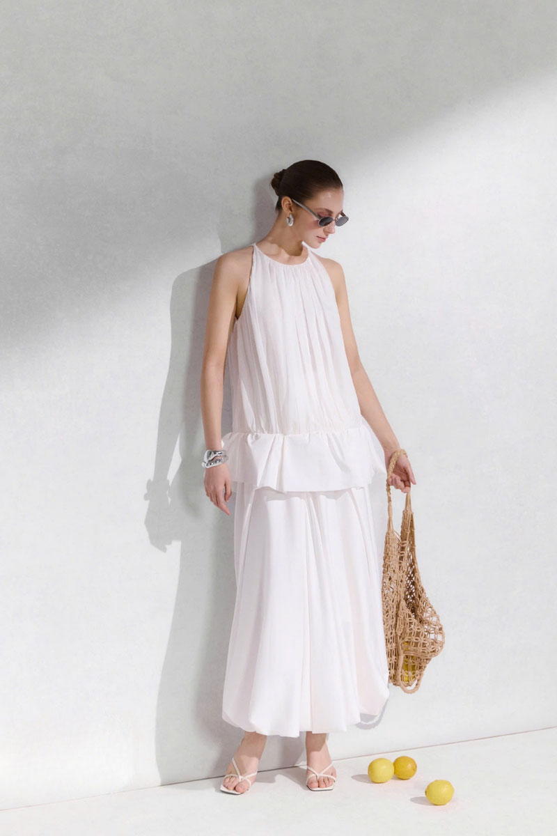 Arti Apparel MONETA MIDI skirt in a stylish midi length, featuring a flowy design and modern pattern.
