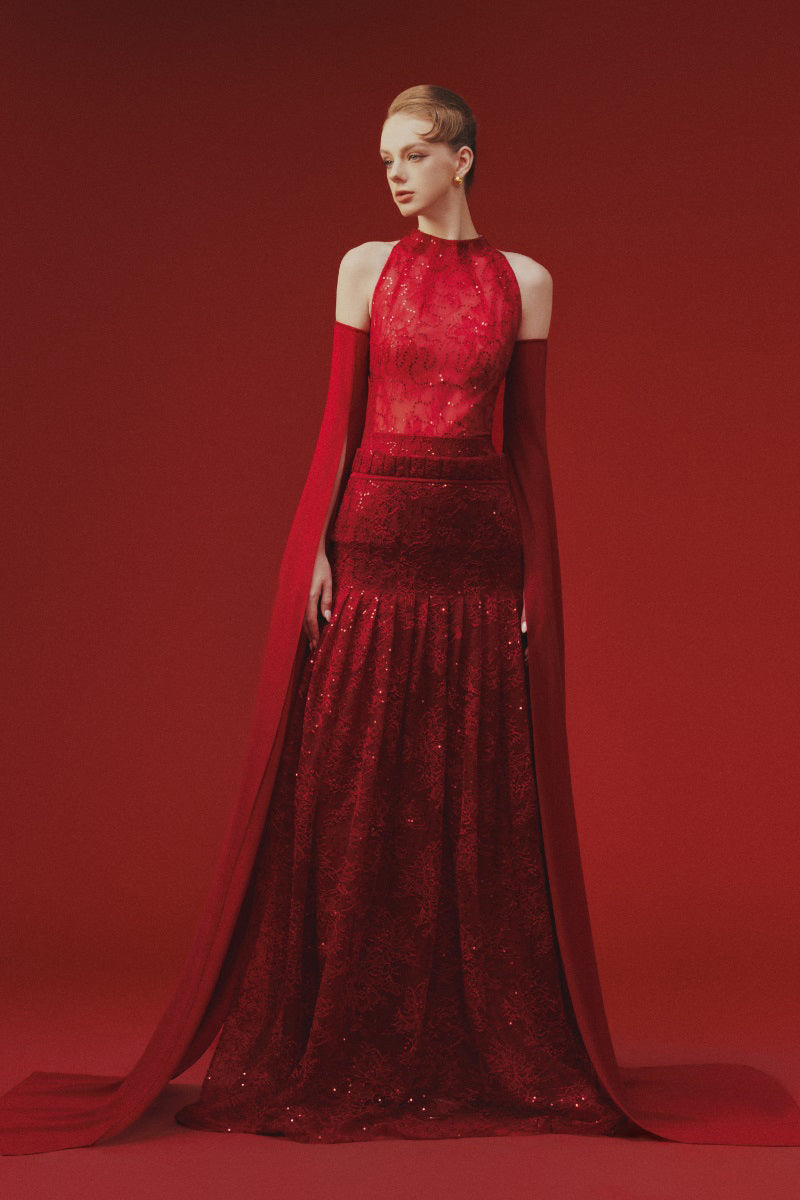 Elegant lace maxi dress by Margée Atelier featuring intricate lace details and a flowing silhouette.