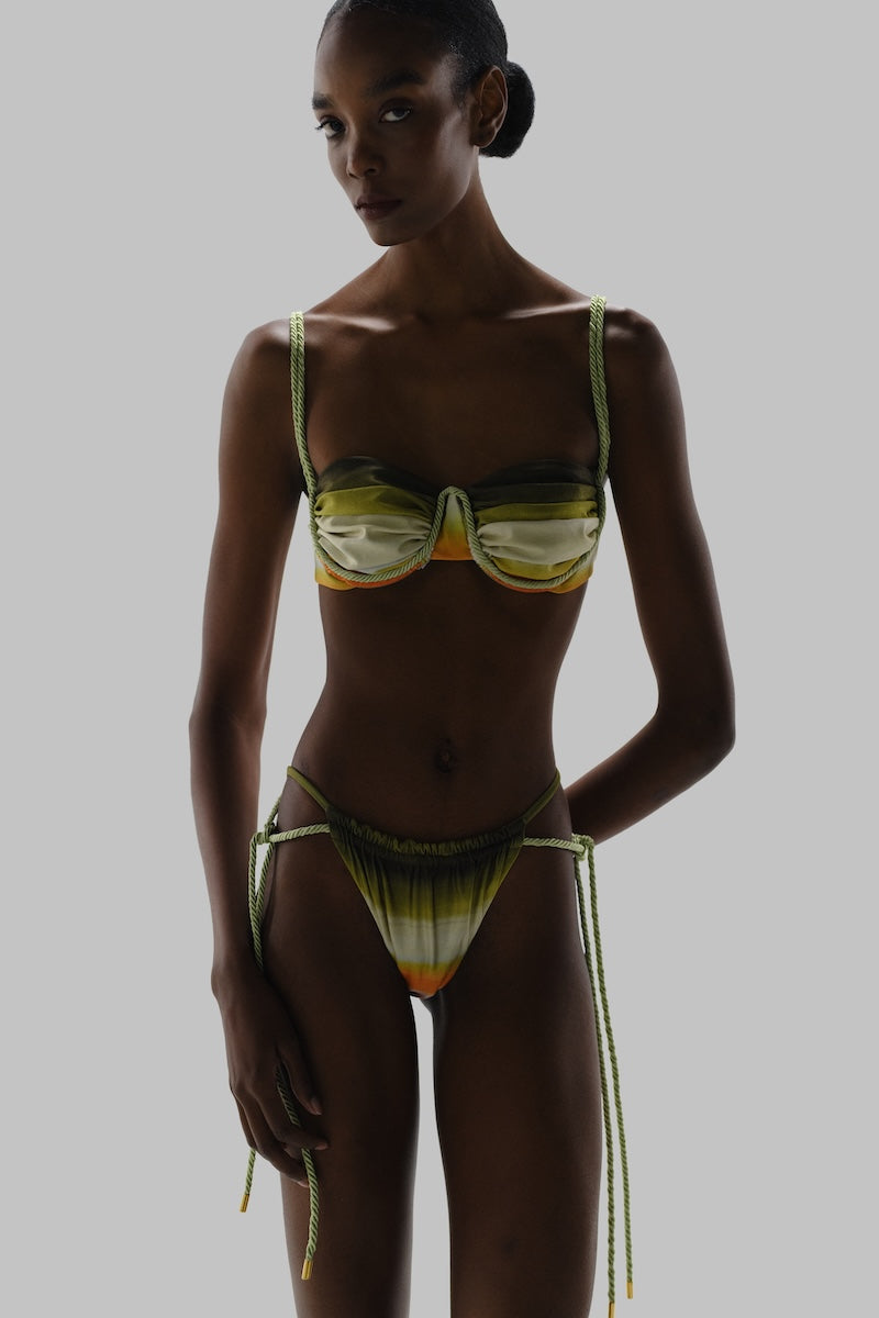 Baobab Lula bikini bottom in vibrant solid color, featuring a sleek, fitted design perfect for beach or poolside wear.