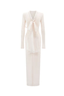 Elegant Doha gown by Arti Apparel featuring intricate embroidery and flowing fabric, displayed on a mannequin.