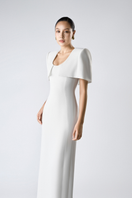 Elegant SILKEN WHISPER gown by TONYY, flowing fabric with delicate details, perfect for formal occasions or evening wear.