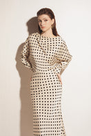 Valenciani long sleeve ivory midi dress displayed on a mannequin, featuring a fitted silhouette and elegant design.