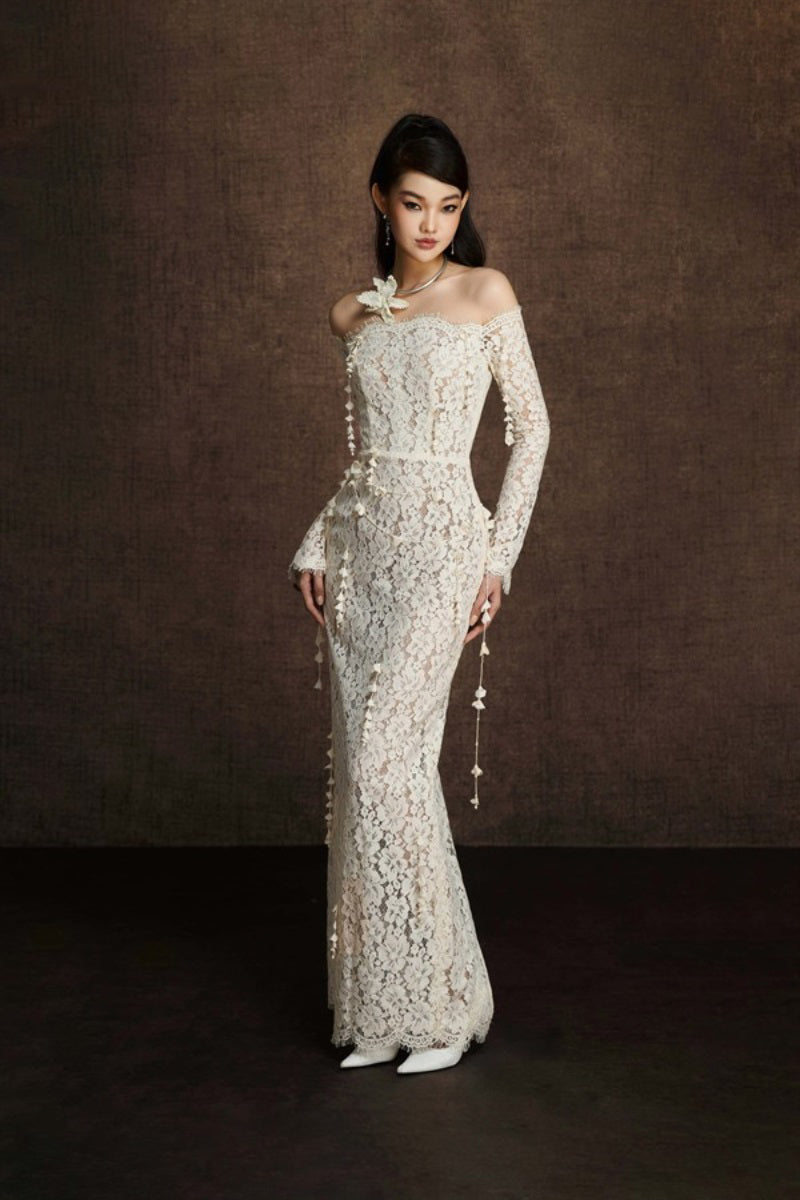 Keira Tong embroidered vine maxi dress featuring intricate floral embroidery and flowing fabric, perfect for elegant summer wear.