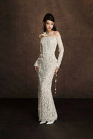 Keira Tong embroidered vine maxi dress featuring intricate embroidery and flowing fabric, perfect for elegant summer occasions.
