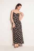 Black Valenciani sweetheart neck spaghetti strap maxi dress displayed on a mannequin, showcasing elegant, flowing fabric.