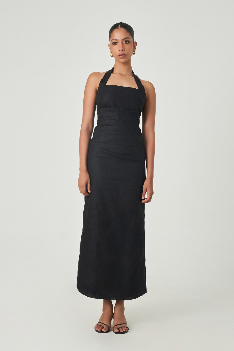 Black Jilliane maxi dress by Summer Away, featuring a flowing silhouette and elegant design, displayed on a hanger.
