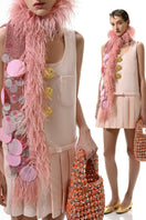 Hand-knitted pink embellished scarf from Lalo, featuring intricate details and soft yarn for a cozy, stylish accessory.