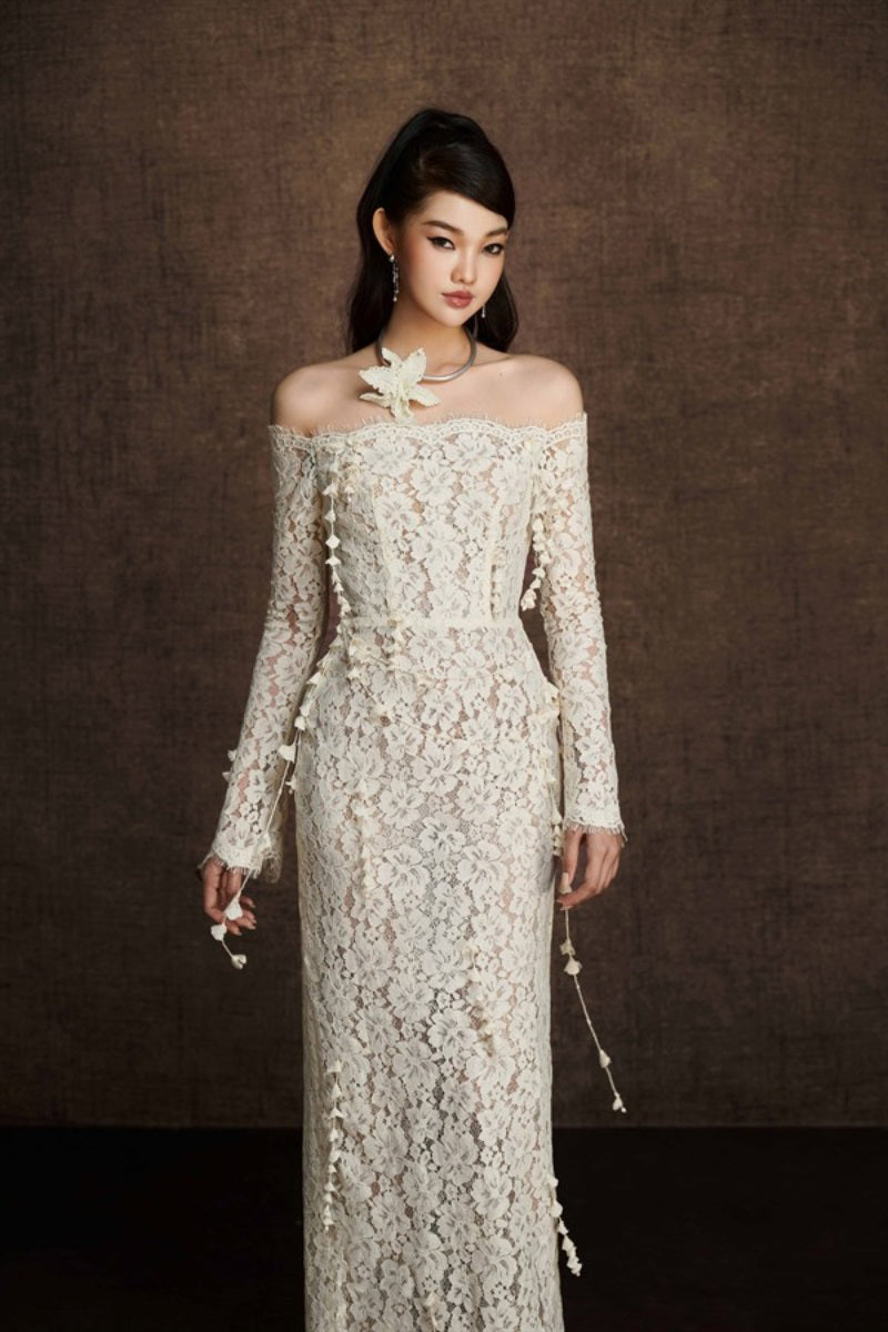 Keira Tong embroidered vine maxi dress featuring floral embroidery on lightweight fabric and flowing silhouette.