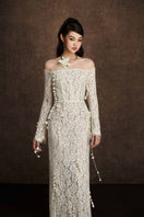 Keira Tong embroidered vine maxi dress featuring intricate floral embroidery and flowing fabric, perfect for elegant summer wear.