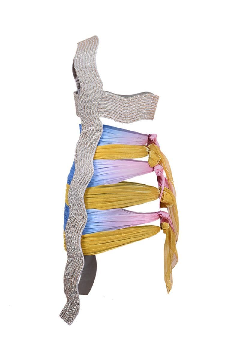 AKHL sequin tie-up mini dress featuring a fitted silhouette, shimmering sequins, and stylish tie-up straps on a fashionable model