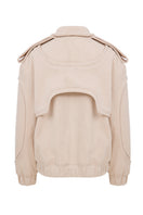 Cream ColoReve Soft Cave Biker Jacket showing its relaxed fit and textured fabric on a hanger.