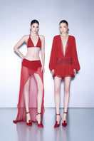 CEM deep V-neck chiffon mini dress with flowing fabric and sleeveless design, perfect for elegant summer occasions.