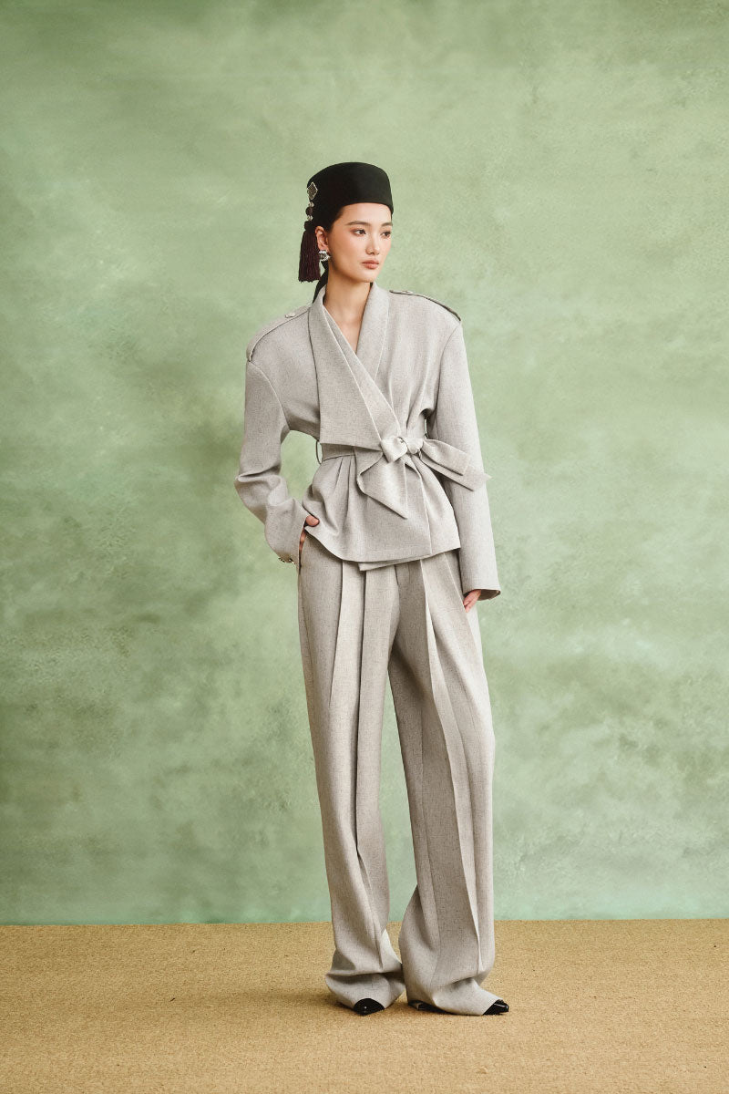 White Plan modern oriental structured co-ords set with a fitted top and matching high-waisted pants, stylish and contemporary design.