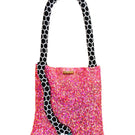 Pink Serpent Small Shoulder Bag by SAC DE SOUL with black and white accents, featuring a sleek, stylish design.