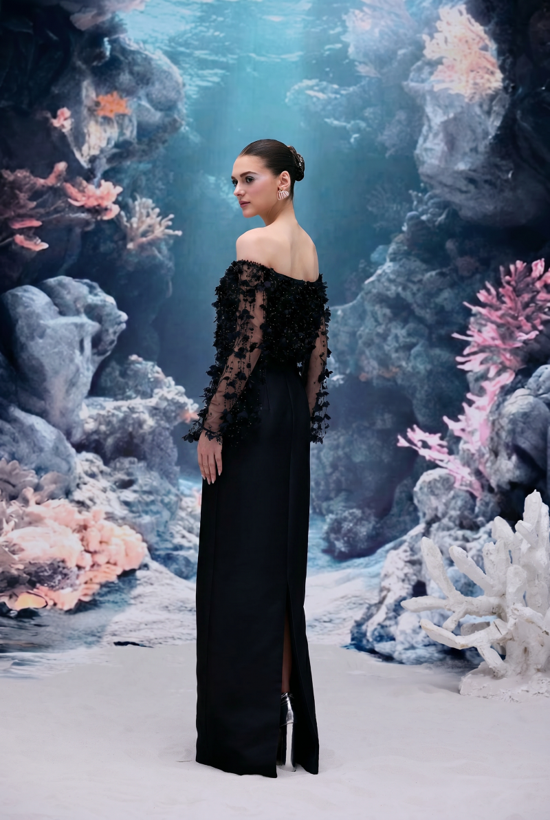 Black Yvette tulle and royal taffeta gown by 21Six, featuring elegant layered fabric and a sophisticated evening dress silhouette.