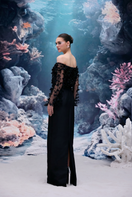 Black Yvette tulle and royal taffeta gown by 21Six featuring a flowing silhouette and elegant design.