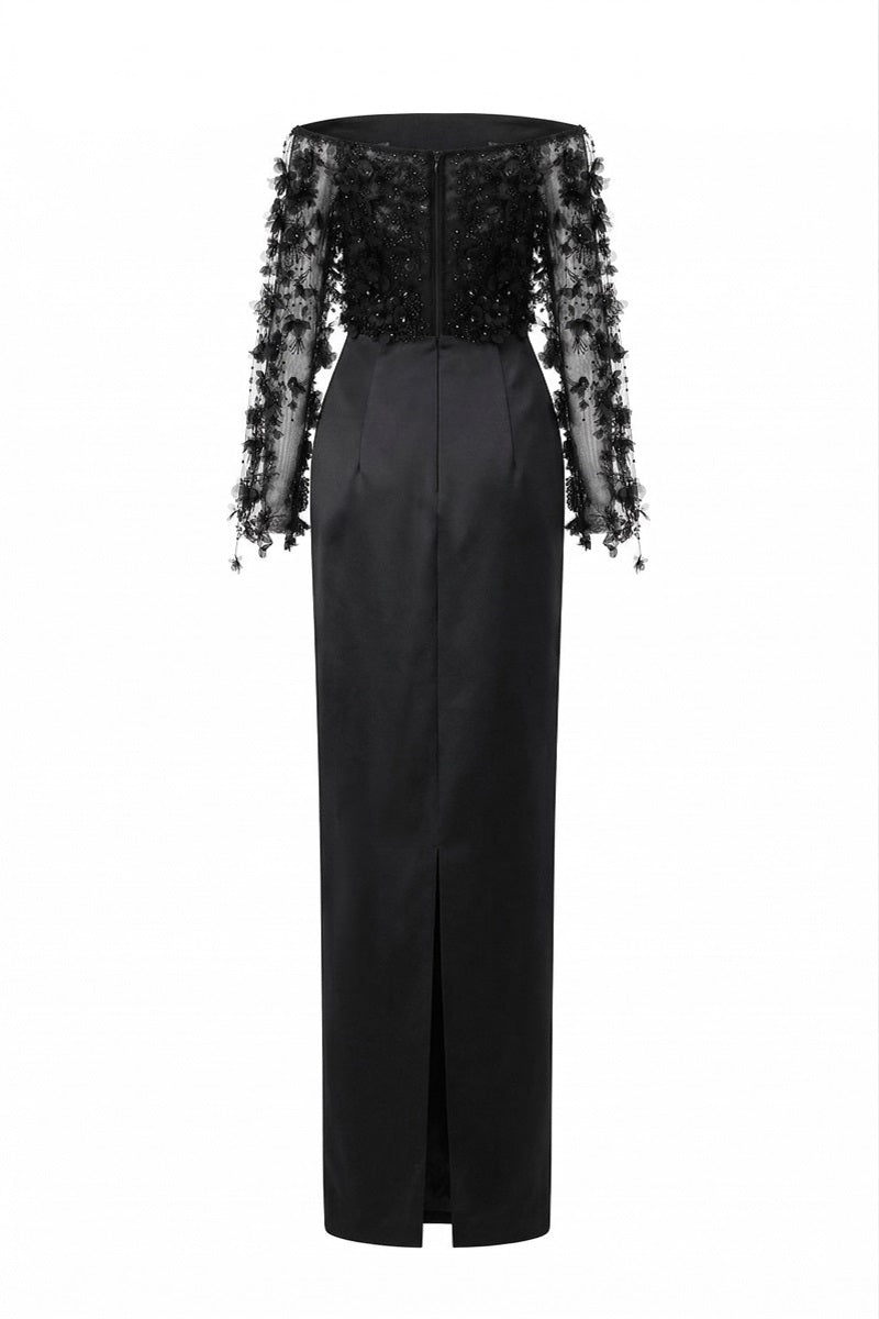 Black Yvette tulle and royal taffeta gown by 21Six, featuring a flowing silhouette and elegant design.
